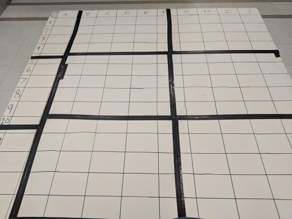 The backing poster board before any Post-Its were applied. Each side is approximately eight feet long.